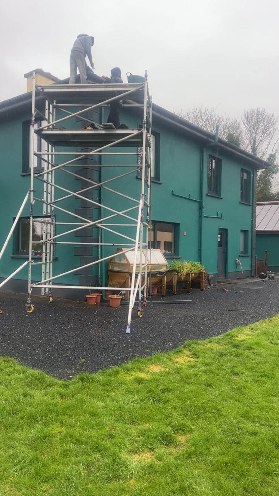 roofers working on a scaffold